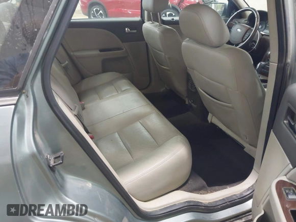 2008 Ford Taurus SEL with VIN 1FAHP24W18G159322, listed as a IAAI auction lot 42144590 with 163,397 mi miles and . Bid and sale history available at DreamBid. Image 8.
