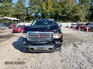 2018 GMC Canyon 4WD SLT with VIN 1GTG6DEN4J1296628, listed as a Copart auction lot 77135484 with 74,486 mi miles and Salvage Title. Bid and sale history available at carsss.com. Image 14.