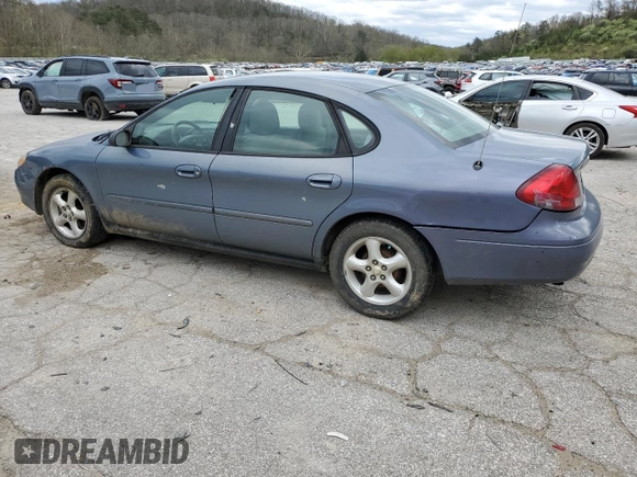 2000 Ford Taurus SE z VIN 1FAFP53U5YA259273, wystawiony jako Copart lot #52787305 z przebiegiem 234 848 mil mil oraz Szkoda całkowita • Salvage title. Historia ofert i sprzedaży dostępna na DreamBid. Obrazek 2.
