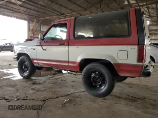1990 Ford Bronco z VIN 1FMCU14TXLUA68729, wystawiony jako Copart lot #45366995 z przebiegiem 389 150 mil mil oraz Czysty tytuł • Clean title. Historia ofert i sprzedaży dostępna na DreamBid. Obrazek 2.