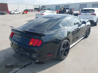 2015 Ford Mustang EcoBoost with VIN 1FA6P8TH3F5418205, listed as a IAAI auction lot 42552784 with 124,782 mi miles and . Bid and sale history available at DreamBid. Image 4.