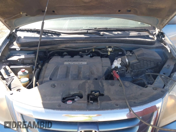 2010 Honda Odyssey EX-L with VIN 5FNRL3H7XAB052742, listed as a IAAI auction lot 41705935 with 205,190 mi miles and . Bid and sale history available at DreamBid. Image 10.