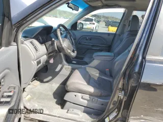 2005 Honda Pilot EX-L z VIN 5FNYF18635B001295, wystawiony jako Copart lot #52434555 z przebiegiem 318 797 mil mil oraz Szkoda całkowita • Salvage title. Historia ofert i sprzedaży dostępna na DreamBid. Obrazek 7.