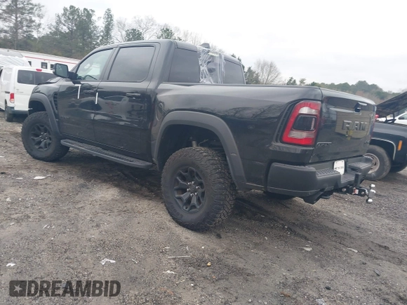 2022 Ram 1500 TRX with VIN 1C6SRFU9XNN476106, listed as a IAAI auction lot 41627895 with 21,992 mi miles and . Bid and sale history available at DreamBid. Image 3.