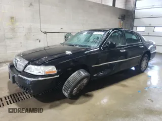 2007 Lincoln Town Car Signature Limited z VIN 1LNHM82V27Y638160, wystawiony jako Copart lot #59788775 z przebiegiem 116 282 mil mil oraz Szkoda całkowita • Salvage title. Historia ofert i sprzedaży dostępna na DreamBid. Obrazek 1.