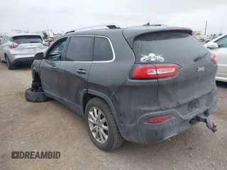2014 Jeep Cherokee Limited with VIN 1C4PJLDS9EW301718, listed as a IAAI auction lot 41615778 with 114,022 mi miles and . Bid and sale history available at DreamBid. Image 3.