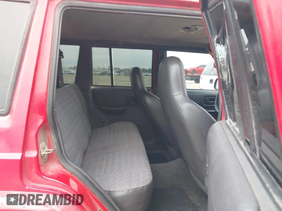 2000 Jeep Cherokee with VIN 1J4FT48S6YL206569, listed as a IAAI auction lot 41561948 with 189,544 mi miles and . Bid and sale history available at DreamBid. Image 8.