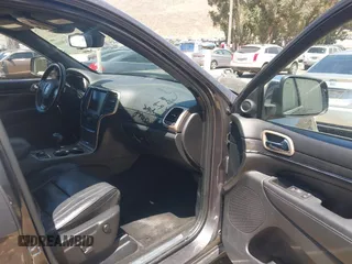 2015 Jeep Grand Cherokee Overland with VIN 1C4RJFCG7FC839778, listed as a IAAI auction lot 42490111 with 160,040 mi miles and . Bid and sale history available at DreamBid. Image 5.
