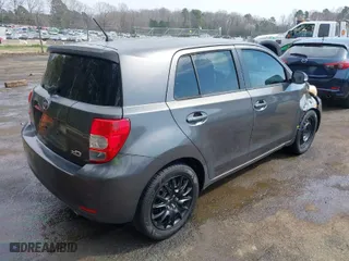 2008 Scion xD with VIN JTKKU10438J018528, listed as a IAAI auction lot 41749318 with 162,052 mi miles. Bid and sale history available at carsss.com. Image 4.