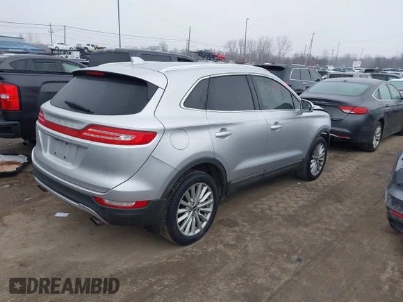2019 Lincoln MKC Standard with VIN 5LMCJ1D91KUL27746, listed as a IAAI auction lot 41552362 with 94,659 mi miles. Bid and sale history available at carsss.com. Image 4.