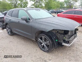 2018 Volvo XC60 Momentum with VIN LYV102RK5JB105691, listed as a IAAI auction lot 42299040 with 82,300 mi miles and . Bid and sale history available at DreamBid. Image 1.