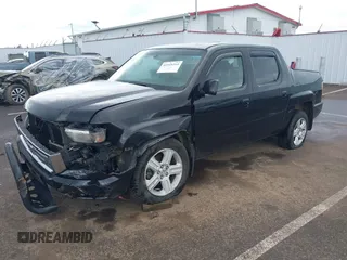 2011 Honda Ridgeline RTL with VIN 5FPYK1F53BB001385, listed as a IAAI auction lot 41945219 with 168,713 mi miles and . Bid and sale history available at DreamBid. Image 2.