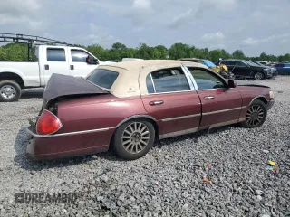 2004 Lincoln Town Car Signature z VIN 1LNHM81W54Y686970, wystawiony jako Copart lot #55615565 z przebiegiem 1 644 925 mil mil oraz Szkoda całkowita • Salvage title. Historia ofert i sprzedaży dostępna na DreamBid. Obrazek 3.