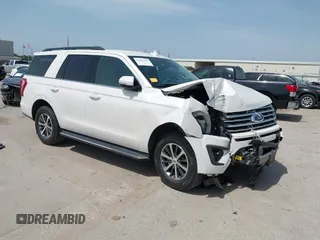 2019 Ford Expedition XLT z VIN 1FMJU1HT3KEA07331, wystawiony jako IAAI lot #42201946 z przebiegiem 100 990 mil mil oraz . Historia ofert i sprzedaży dostępna na DreamBid. Obrazek 1.