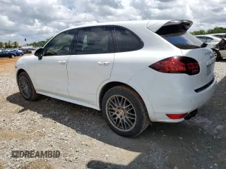 2014 Porsche Cayenne GTS с VIN WP1AD2A27ELA70118, выставлен на аукционе Copart как лот 56405945 с пробегом 179 529 миль миль и Списание • Salvage title. История ставок и продаж доступна на DreamBid. Изображение 2.
