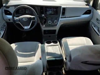 2015 Toyota Sienna LE AAS with VIN 5TDKK3DC7FS686021, listed as a Copart auction lot 66761315 with 241,779 mi miles and Clean title. Bid and sale history available at DreamBid. Image 8.