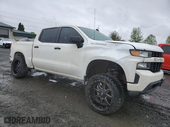 2019 Chevrolet Silverado 1500 Custom with VIN 3GCPYBEH7KG227329, listed as a Copart auction lot 50712934 with 99,428 mi miles and Salvage Title. Bid and sale history available at DreamBid. Image 4.