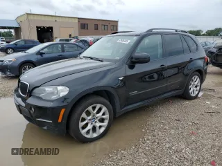 2012 BMW X5 35i with VIN 5UXZV4C50CL989832, listed as a Copart auction lot 62606485 with 157,025 mi miles and Clean title. Bid and sale history available at DreamBid. Image 1.