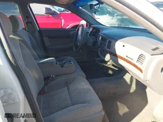 2003 Chevrolet Impala with VIN 2G1WF52E339264945, listed as a IAAI auction lot 41231159 with 166,388 mi miles. Bid and sale history available at carsss.com. Image 5.