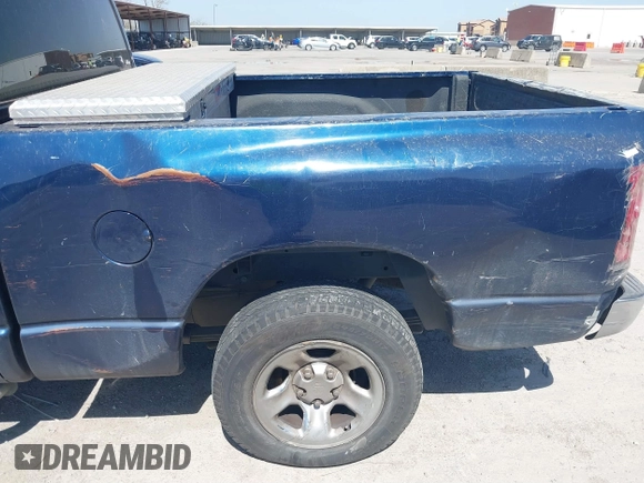 2004 Dodge 1500 SLT with VIN 1D7HA18N04J144868, listed as a IAAI auction lot 41870559 with 157,379 mi miles. Bid and sale history available at carsss.com. Image 6.