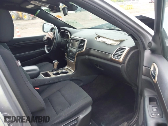 2016 Jeep Grand Cherokee Laredo with VIN 1C4RJFAG3GC366613, listed as a IAAI auction lot 42503974 with 156,013 mi miles and . Bid and sale history available at DreamBid. Image 5.
