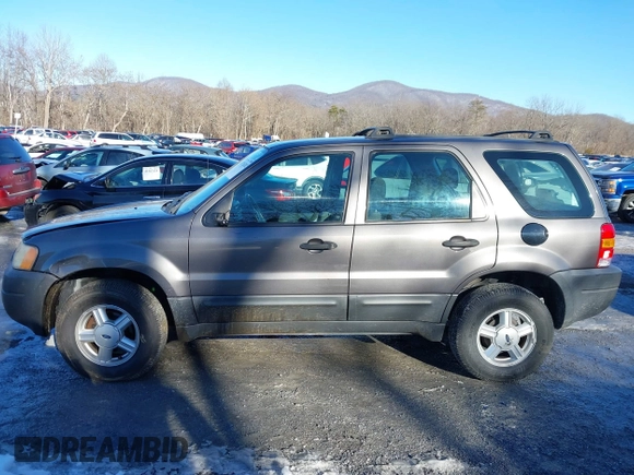 2003 Ford Escape XLS Popular with VIN 1FMYU02103KE02490, listed as a IAAI auction lot 41326202 with 190,280 mi miles and . Bid and sale history available at DreamBid. Image 15.