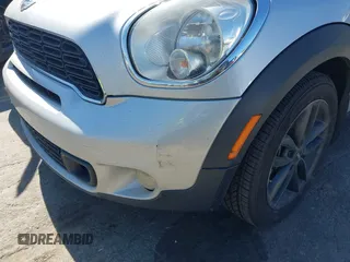 2013 MINI Countryman S z VIN WMWZC3C52DWP22139, wystawiony jako IAAI lot #42060025 z przebiegiem 210 124 mil mil oraz . Historia ofert i sprzedaży dostępna na DreamBid. Obrazek 6.