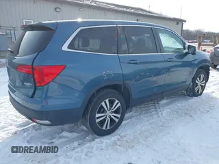 2017 Honda Pilot EX-L with VIN 5FNYF6H55HB005809, listed as a IAAI auction lot 41588106 with 110,197 mi miles and . Bid and sale history available at DreamBid. Image 4.