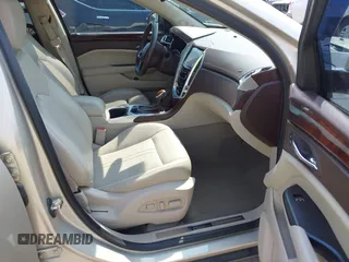 2015 Cadillac SRX Premium Collection with VIN 3GYFNDE38FS561936, listed as a IAAI auction lot 42266801 with 64,820 mi miles and . Bid and sale history available at DreamBid. Image 5.