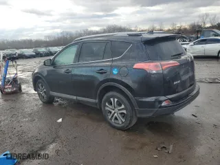 2018 Toyota RAV4 LE with VIN 2T3BFREV3JW787927, listed as a Copart auction lot 46825865 with 103,584 mi miles and Salvage Title. Bid and sale history available at carsss.com. Image 2.
