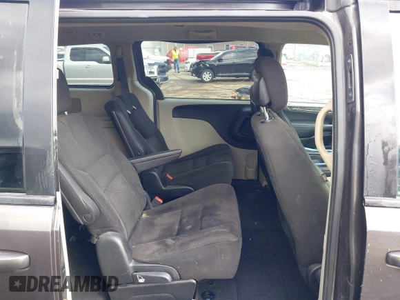 2015 Dodge Grand Caravan SXT with VIN 2C4RDGCG8FR541373, listed as a IAAI auction lot 41990500 with 114,100 mi miles and . Bid and sale history available at DreamBid. Image 8.