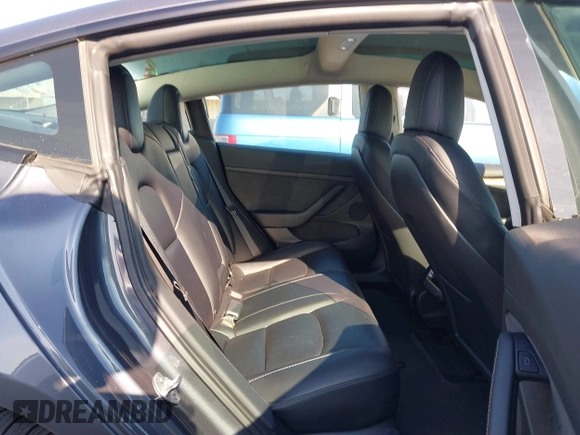 2023 Tesla Model 3 with VIN 5YJ3E1EA7PF447409, listed as a IAAI auction lot 41965416 with 40,033 mi miles and . Bid and sale history available at DreamBid. Image 8.