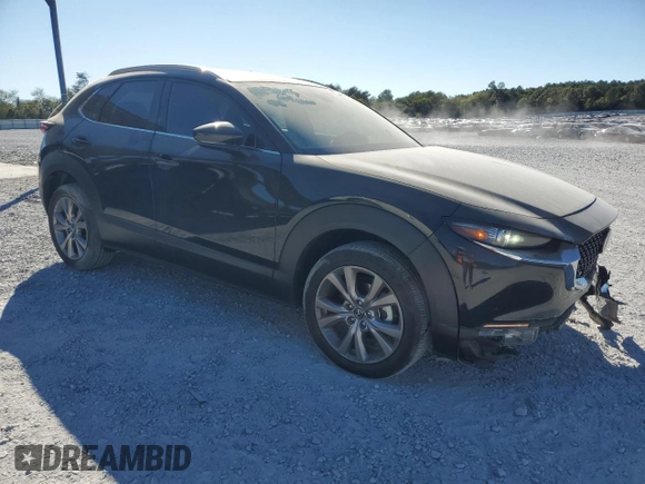 2020 Mazda CX-30 Premium with VIN 3MVDMAEM4LM137806, listed as a Copart auction lot 76620304 with 65,071 mi miles and Salvage title. Bid and sale history available at DreamBid. Image 4.