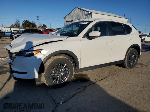 2021 Mazda CX-5 Touring with VIN JM3KFBCM9M0336910, listed as a Copart auction lot 48032275 with 65,515 mi miles and Salvage Title. Bid and sale history available at carsss.com. Image 1.