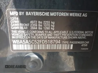 2015 BMW 5 Series 528i with VIN WBA5A5C52FD518794, listed as a IAAI auction lot 42571091 with 165,744 mi miles and . Bid and sale history available at DreamBid. Image 9.