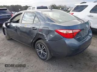 2017 Toyota Corolla L with VIN 2T1BURHEXHC814658, listed as a IAAI auction lot 41696935 with 94,598 mi miles and . Bid and sale history available at DreamBid. Image 3.