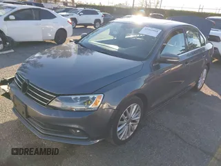 2015 Volkswagen Jetta Sport with VIN 3VWD17AJ2FM318669, listed as a IAAI auction lot 41266868 with 124,539 mi miles and . Bid and sale history available at DreamBid. Image 2.