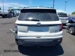 2019 Honda Passport Elite z VIN 5FNYF8H05KB009575, wystawiony jako IAAI lot #42804678 z przebiegiem 70 468 mil mil oraz . Historia ofert i sprzedaży dostępna na DreamBid. Obrazek 17.