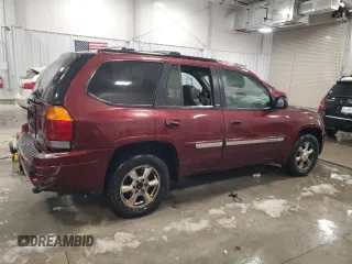 2003 GMC Envoy SLT with VIN 1GKDT13S532241707, listed as a Copart auction lot 86694024 with 185,480 mi miles and Clean Title. Bid and sale history available at carsss.com. Image 3.