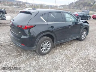 2023 Mazda CX-5 2.5 S Carbon Edition with VIN JM3KFBCM9P0130796, listed as a IAAI auction lot 41956104 with 21,796 mi miles. Bid and sale history available at carsss.com. Image 4.