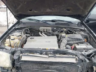 2008 Ford Escape Hybrid with VIN 1FMCU59H28KB66264, listed as a IAAI auction lot 41656399 with 259,238 mi miles. Bid and sale history available at carsss.com. Image 10.