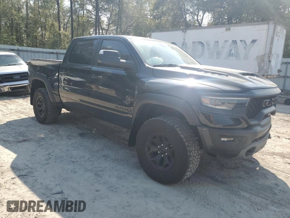 2022 Ram 1500 TRX with VIN 1C6SRFU99NN430718, listed as a Copart auction lot 49576035 with 29,476 mi miles and Salvage title. Bid and sale history available at DreamBid. Image 4.