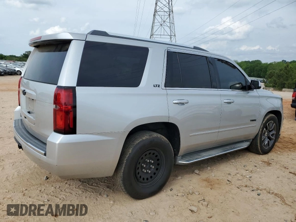 2015 Chevrolet Tahoe LTZ z VIN 1GNSKCKC0FR198361, wystawiony jako Copart lot #54220155 z przebiegiem 176 429 mil mil oraz Szkoda całkowita • Salvage title. Historia ofert i sprzedaży dostępna na DreamBid. Obrazek 3.
