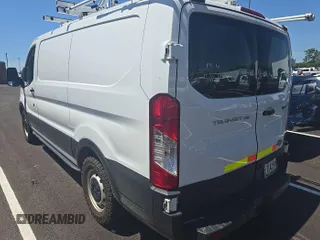 2019 Ford Transit with VIN 1FTYE1ZM6KKA31079, listed as a IAAI auction lot 42906716 with 169,160 mi miles and . Bid and sale history available at DreamBid. Image 20.