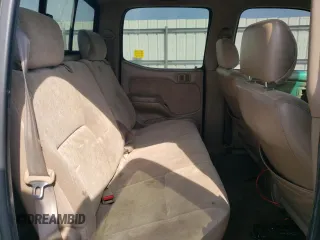 2003 Toyota Tacoma PreRunner z VIN 5TEGM92N73Z162731, wystawiony jako Copart lot #60778595 z przebiegiem 273 207 mil mil oraz Czysty tytuł • Clean title. Historia ofert i sprzedaży dostępna na DreamBid. Obrazek 10.