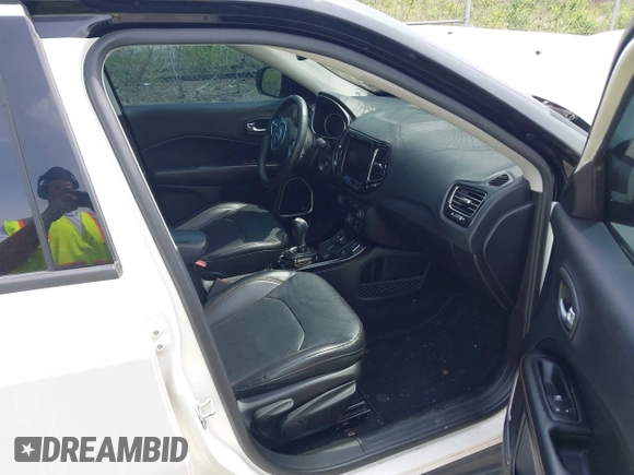 2019 Jeep Compass Limited with VIN 3C4NJDCB2KT704231, listed as a IAAI auction lot 42175991 with 70,892 mi miles and . Bid and sale history available at DreamBid. Image 5.