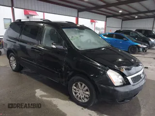 2011 Kia Sedona LX with VIN KNDMG4C71B6376011, listed as a IAAI auction lot 41600258 with 162,025 mi miles. Bid and sale history available at carsss.com. Image 1.