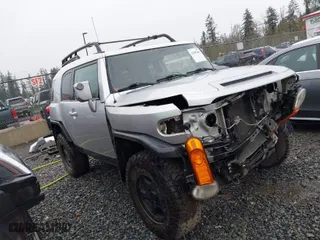 2007 Toyota FJ Cruiser with VIN JTEBU11F570032163, listed as a IAAI auction lot 41999403 with 179,064 mi miles. Bid and sale history available at carsss.com. Image 1.
