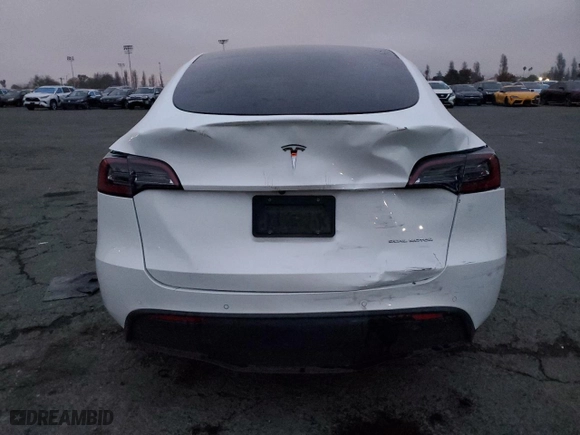 2022 Tesla Model Y Long Range with VIN 7SAYGDEE4NF364721, listed as a Copart auction lot 88514035 with 66,438 mi miles and Salvage Title. Bid and sale history available at carsss.com. Image 6.