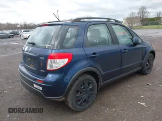 2010 Suzuki SX4 with VIN JS2YB5A37A6300142, listed as a IAAI auction lot 41956392 with 91,808 mi miles and . Bid and sale history available at DreamBid. Image 4.
